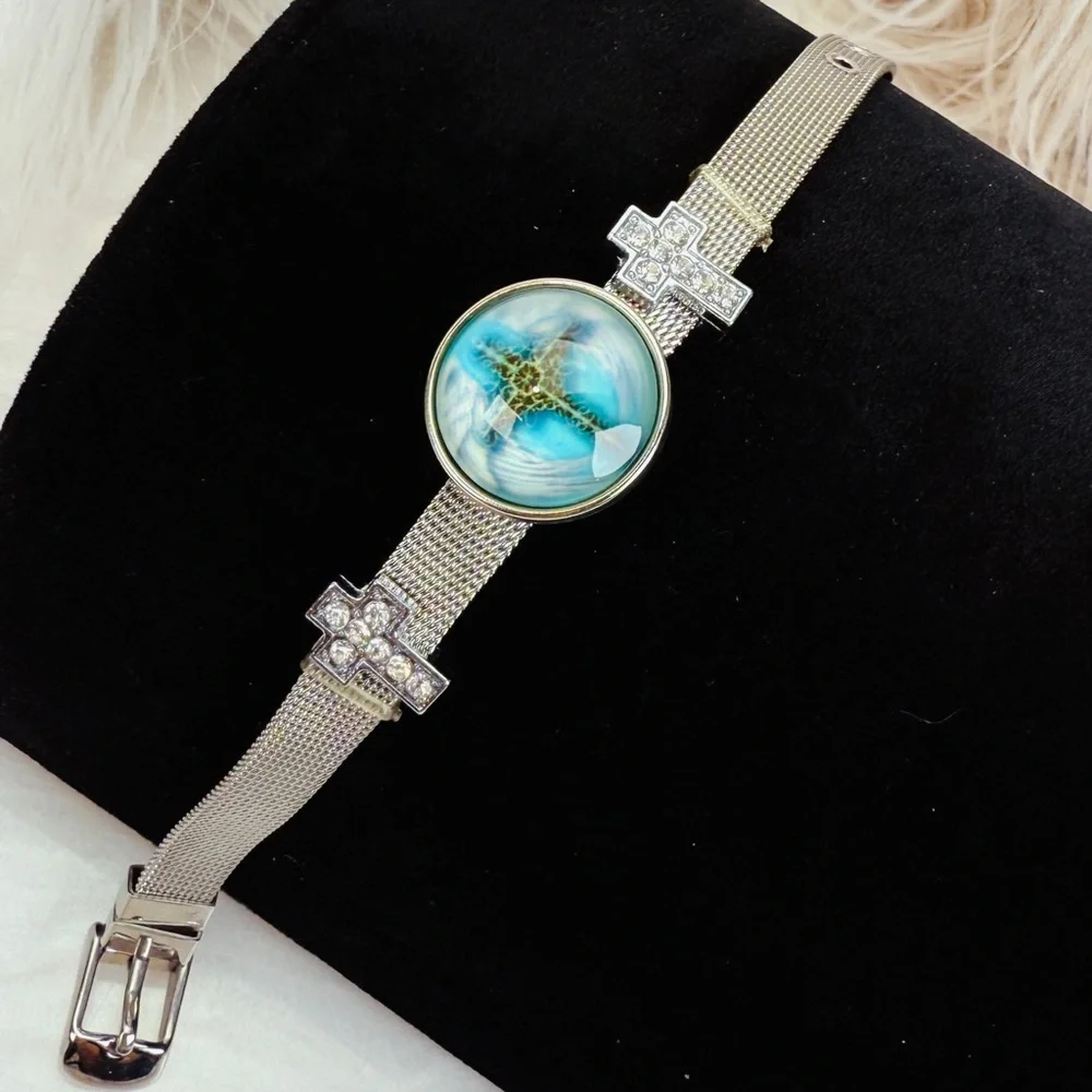 Silvertone Mesh Snap Bracelet with Blue Cross Design